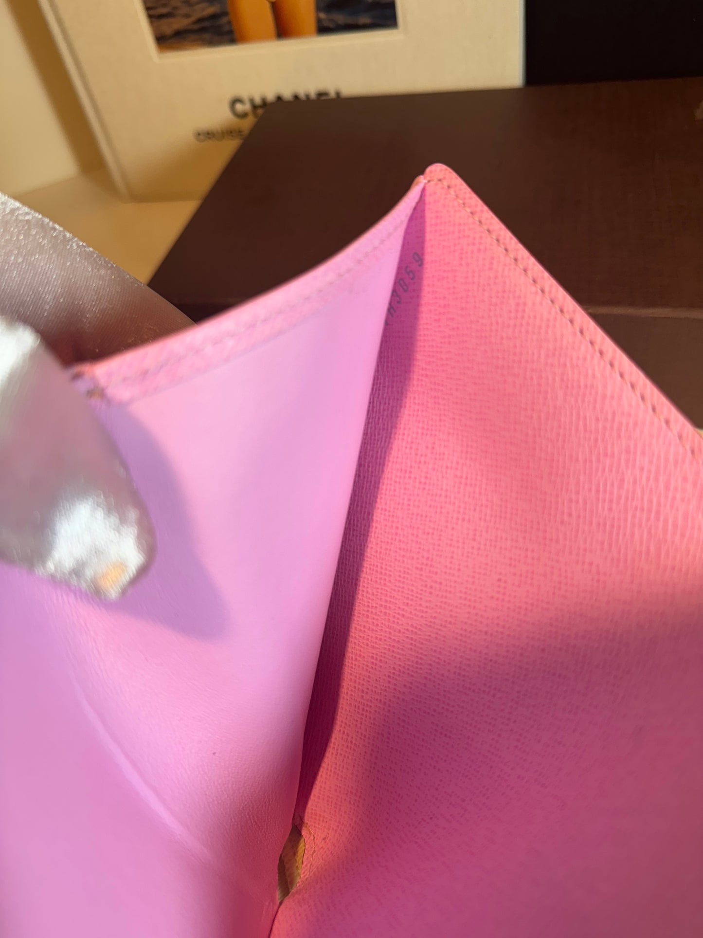 Louis Vuitton white multicolor monogram , the Portefeuille Koala .