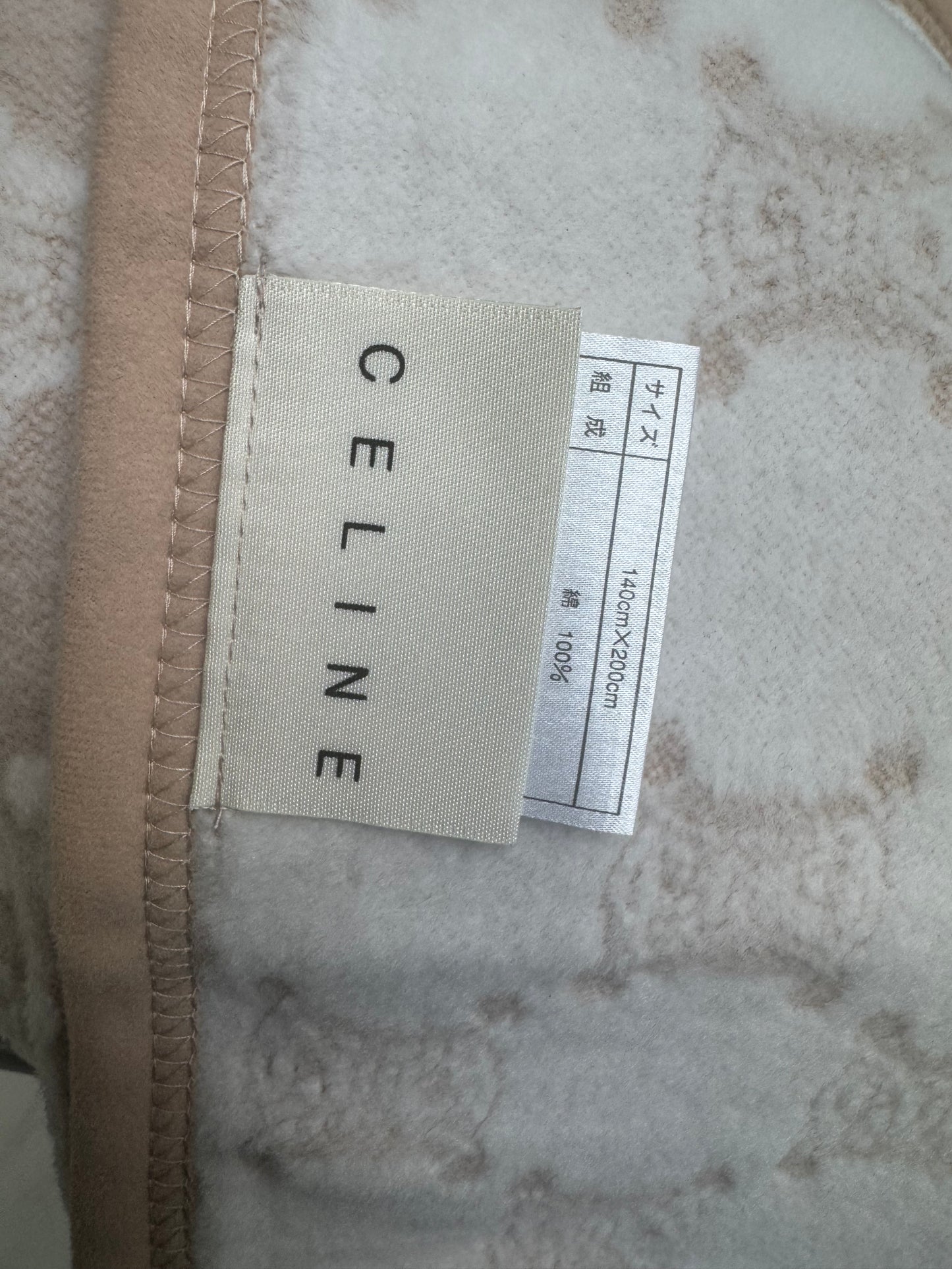 Celine , the Triomphe monogram pattern.