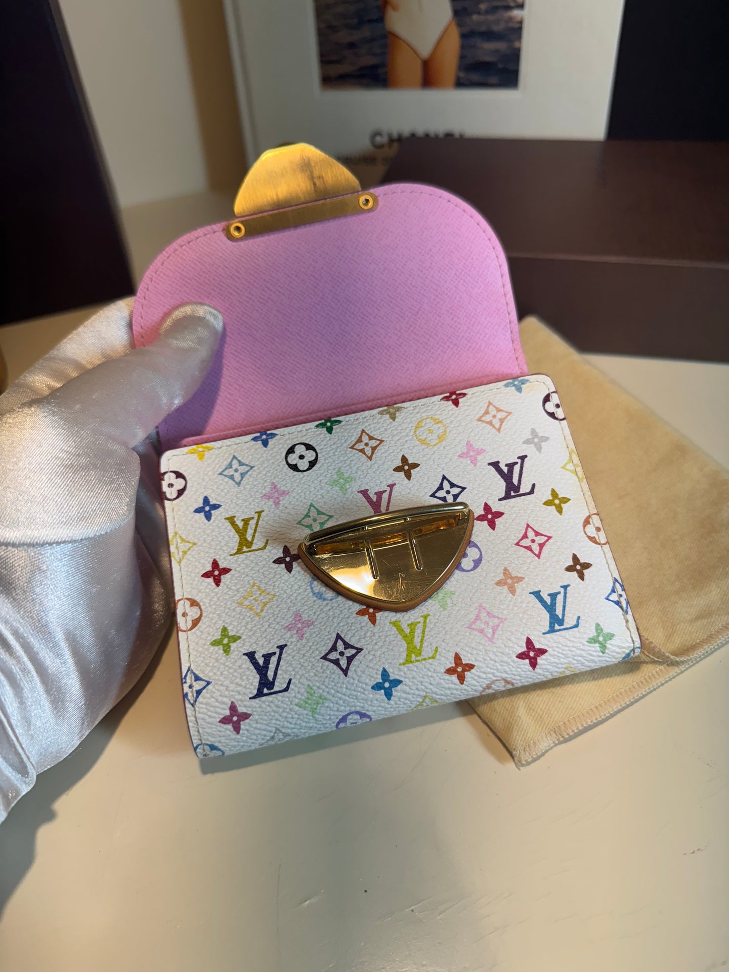Louis Vuitton white multicolor monogram , the Portefeuille Koala .