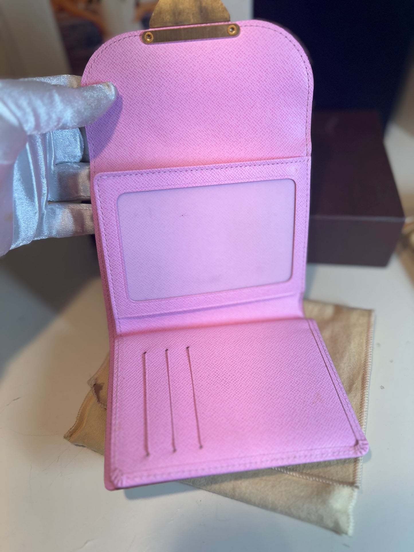 Louis Vuitton white multicolor monogram , the Portefeuille Koala .