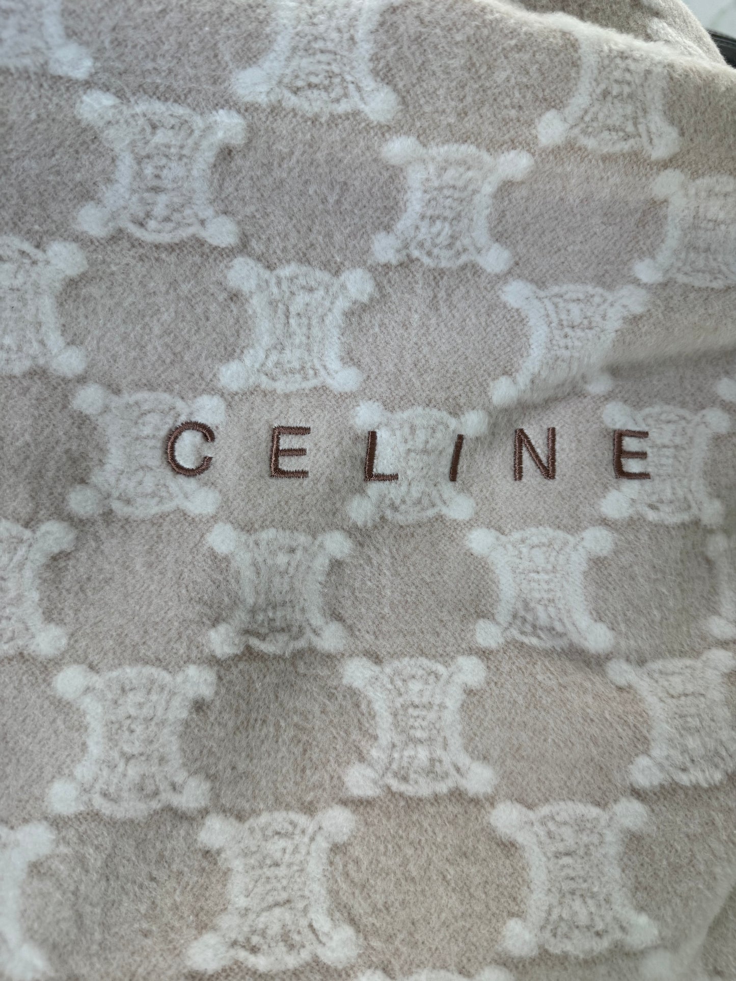Celine , the Triomphe monogram pattern.