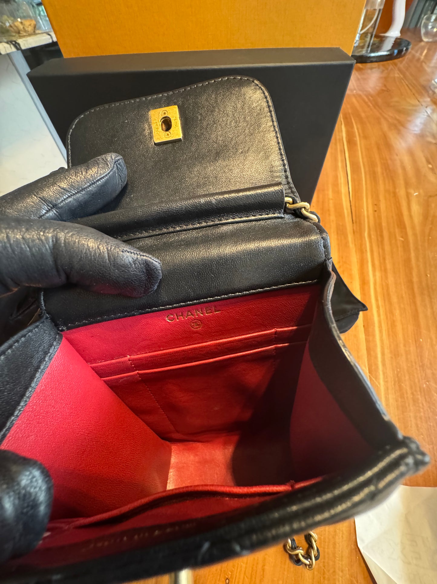 Chanel Pearl-Handle Quilted Phone Holder – Black Lambskin & Gold Hardware – Entrupy Verified