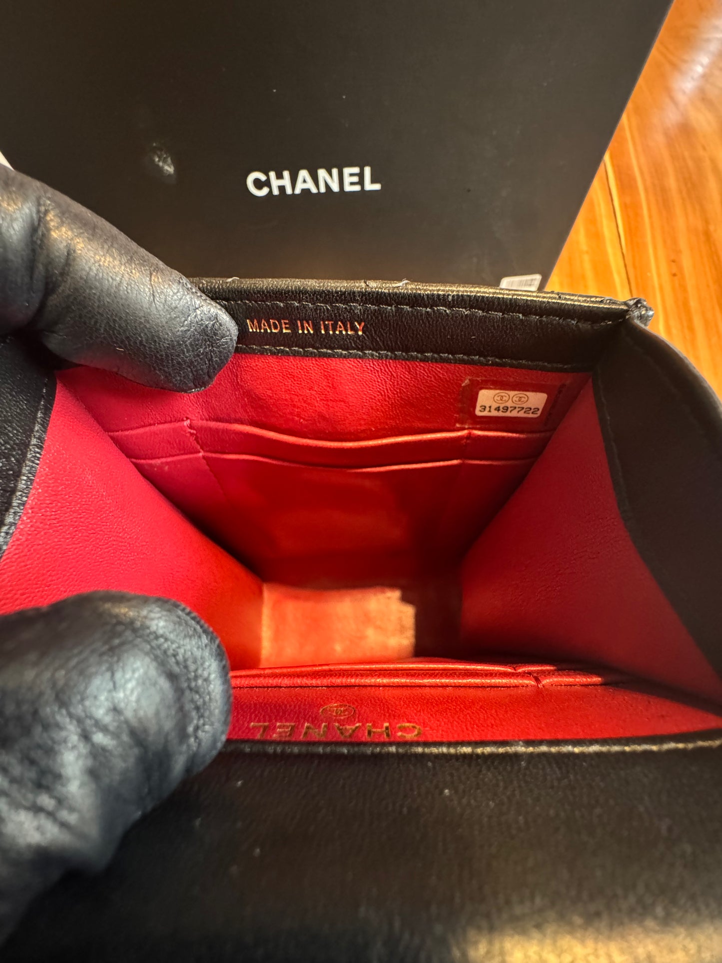 Chanel Pearl-Handle Quilted Phone Holder – Black Lambskin & Gold Hardware – Entrupy Verified