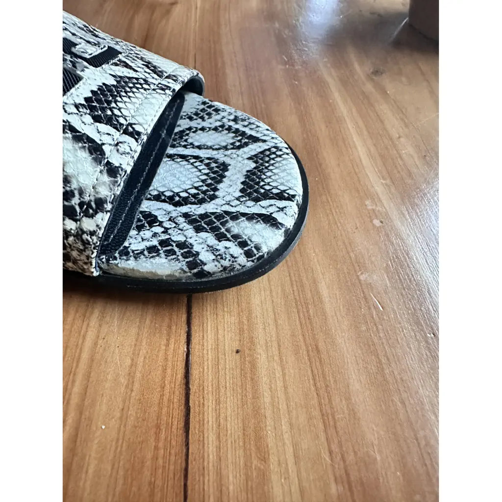 Black and White Givenchy Flats